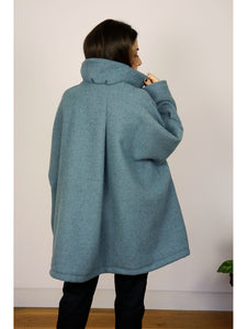 Spring Coat in Air. Inspired by the high-neck coats from the 1960s, this Spring coat is a chic addition to any wardrobe looking for a splash of colour. It's an ideal top layer to throw over a t-shirt on a sunny day or to throw over layers during the colder seasons. 