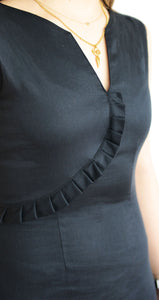 Because you can never go wrong with a little black dress.  This slim fit LBD is structured around the waist and falls to the most flattering part of the leg. It’s embellished with ruffle details and a V-neck collar. Perfect for work or any time you want to throw a sophisticated look together. 
