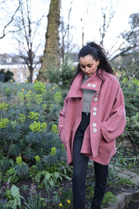 Spring Coat in Rose. Inspired by the high-neck coats from the 1960s, this Spring coat is a chic addition to any wardrobe looking for a splash of colour. It's an ideal top layer to throw over a t-shirt on a sunny day or to throw over layers during the colder seasons. 
