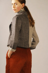 Cropped Split Tone Blazer. The cropped two-tone blazer is a capsule piece for every powerhouse woman. The linen makes for a light and breathable blazer, which perfectly compliments a pair of high waisted suit trousers.